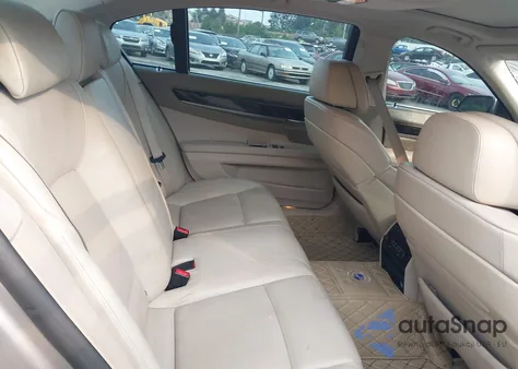 2012 BMW 750Li из США, поврежденный, VIN WBAKB8C55CC965123